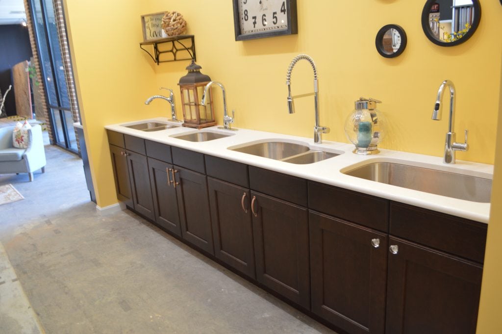 white counter and brown cabinets